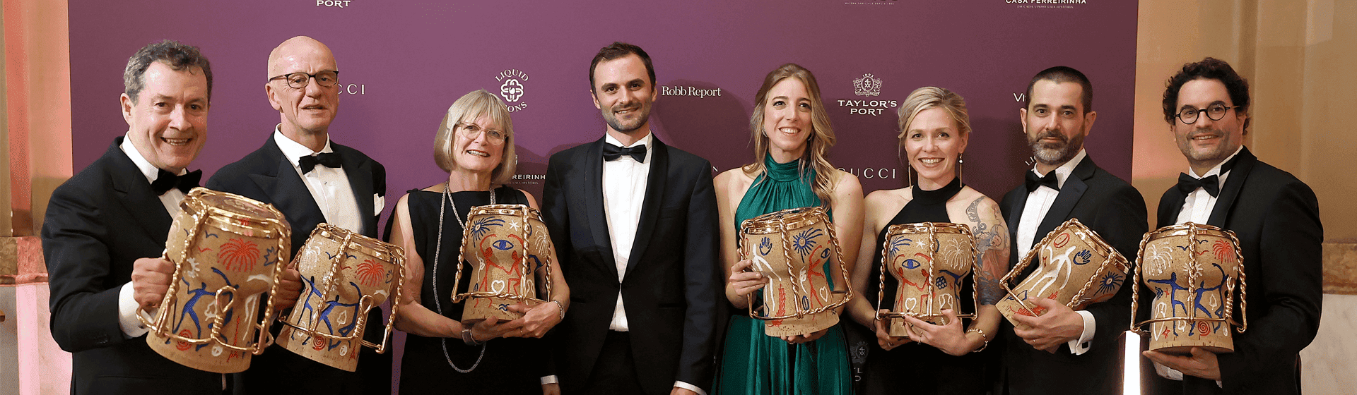 8 Golden Vine Award Recipients pose with their trophies