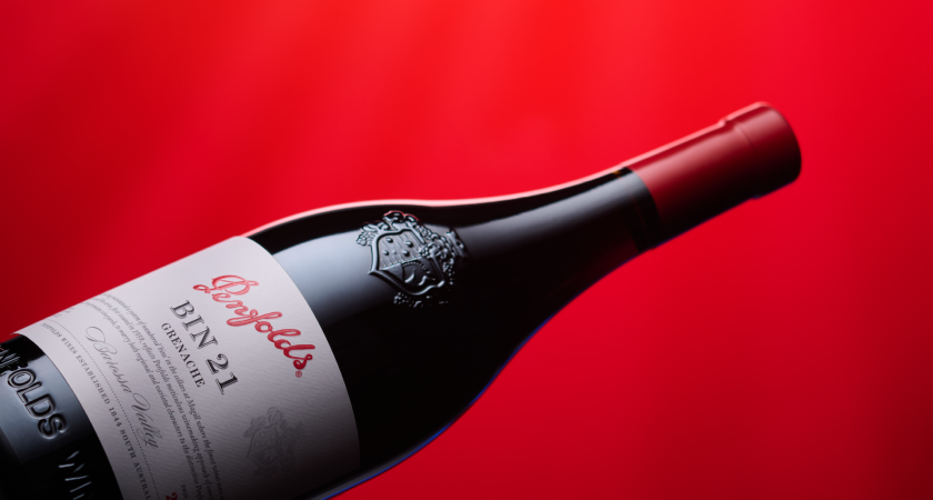 Bottle of Bin 21 Grenache in front of red background